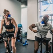 a man and a woman in a gym