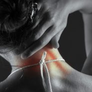 Woman's neck with highlighted pain area.
