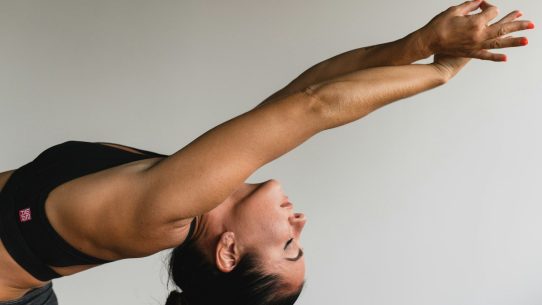 woman stretching arms