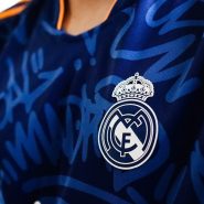 a close up of a soccer jersey with a crown on it