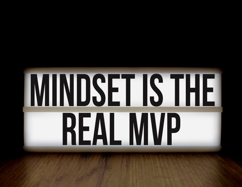 Motivational message'Mindset is the Real MVP' displayed on a lightbox with black background.